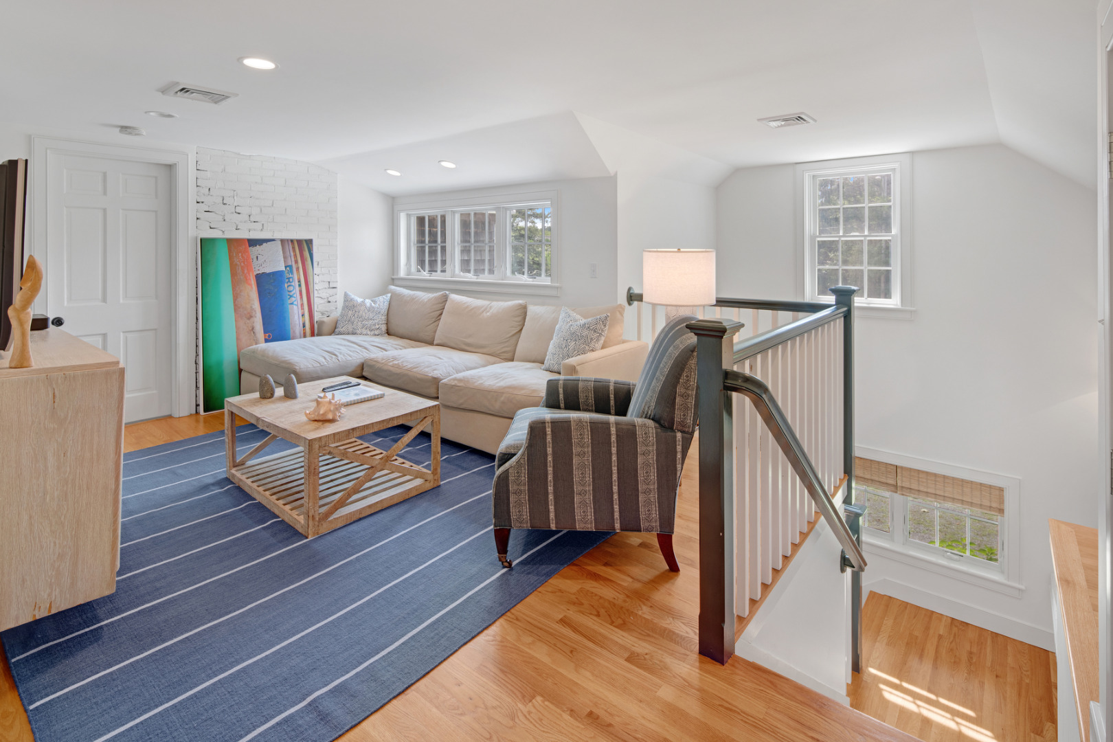 5 Hillman Drive Edgartown, MA 02539 - Photo 20 of 34 a living room with furniture and a wooden floor