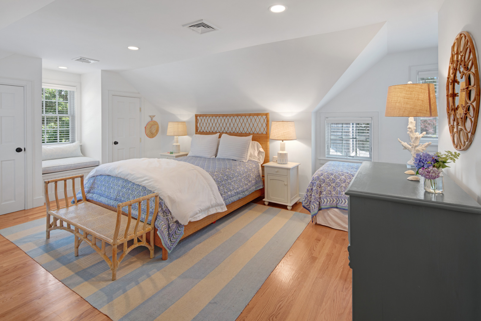 5 Hillman Drive Edgartown, MA 02539 - Photo 21 of 34 a bedroom with a bed and wooden floor