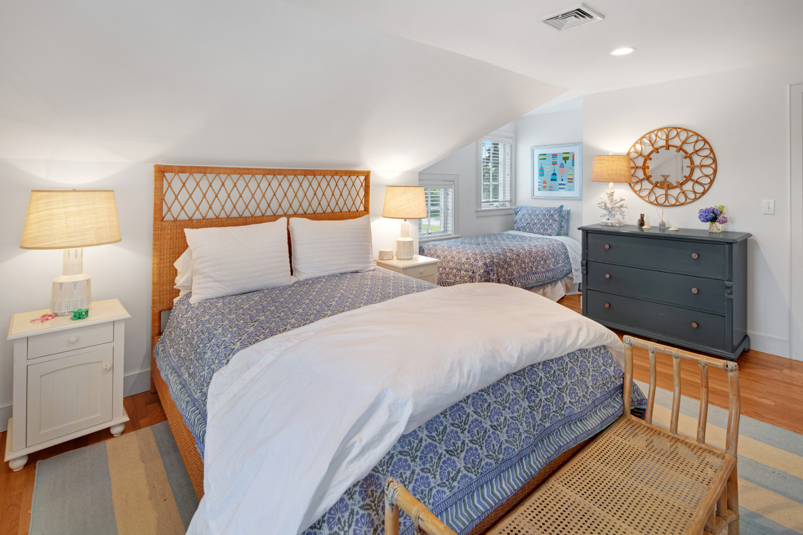 5 Hillman Drive Edgartown, MA 02539 - Photo 23 of 34 a bedroom with a bed and a lamp on dresser