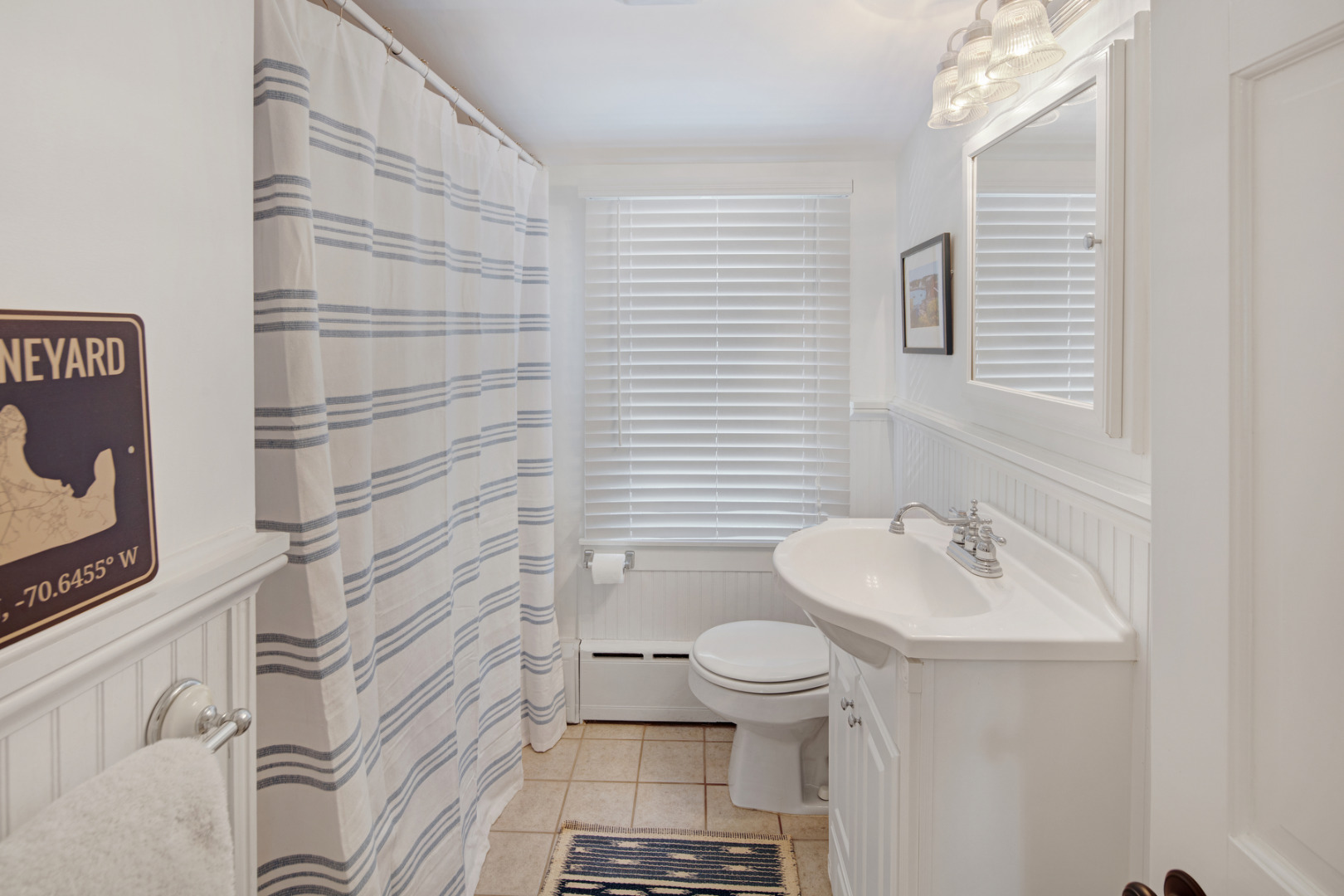 5 Hillman Drive Edgartown, MA 02539 - Photo 27 of 34 a bathroom with a sink toilet and shower