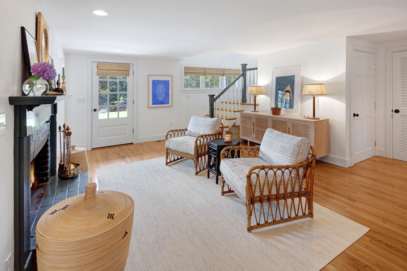 5 Hillman Drive Edgartown, MA 02539 - Photo 9 of 34 a living room with furniture a flat screen tv and a window