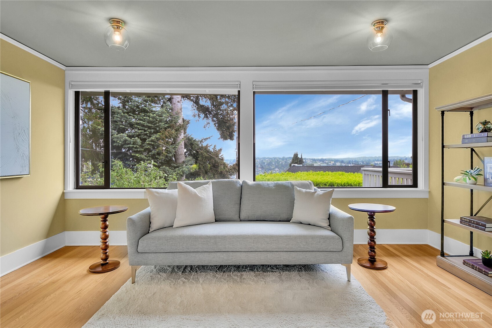 110 Smith Street Seattle, WA 98109 - Photo 13 of 35 a living room with furniture and a large window