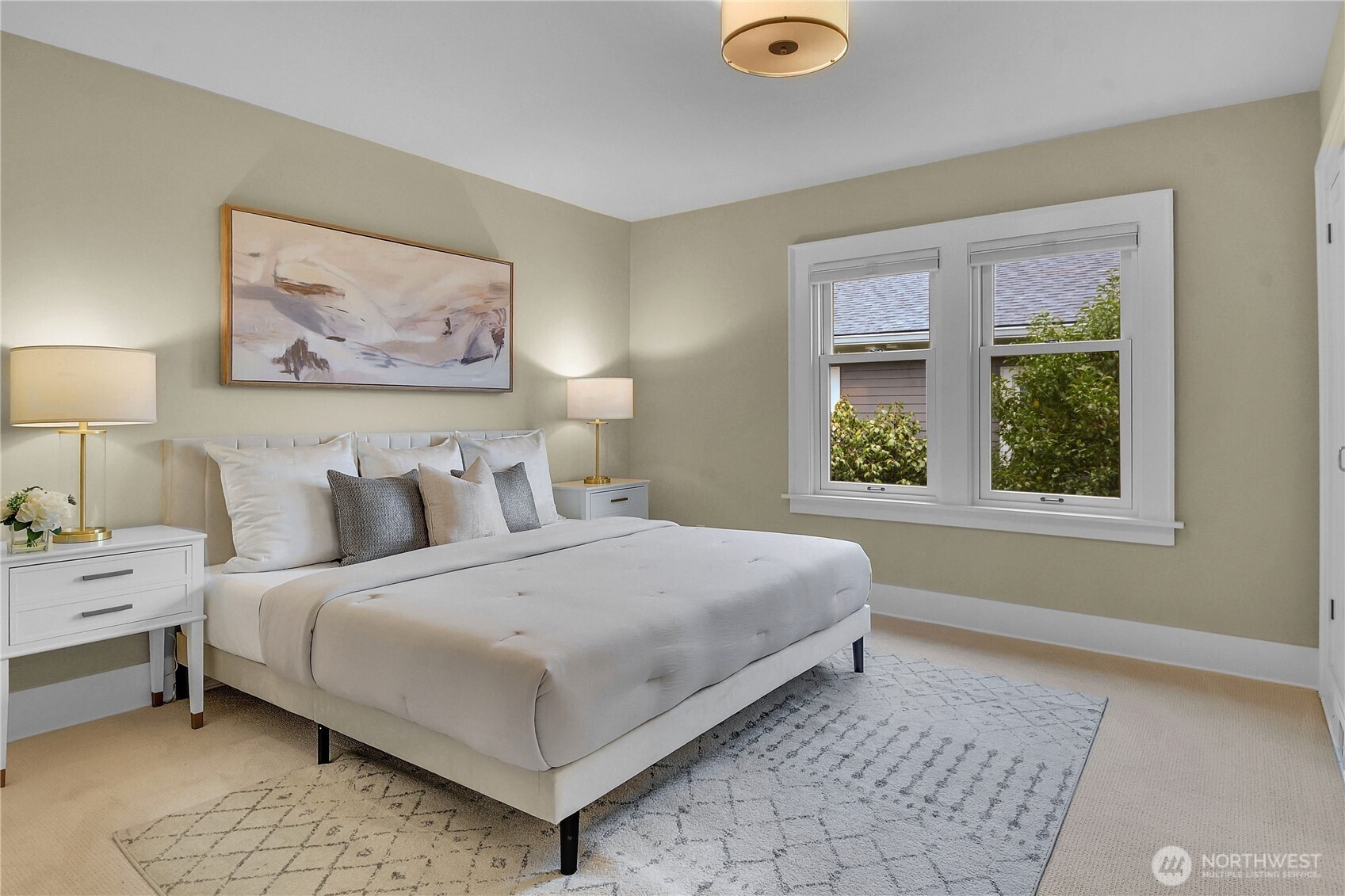 110 Smith Street Seattle, WA 98109 - Photo 16 of 35 a bedroom with a bed and a window