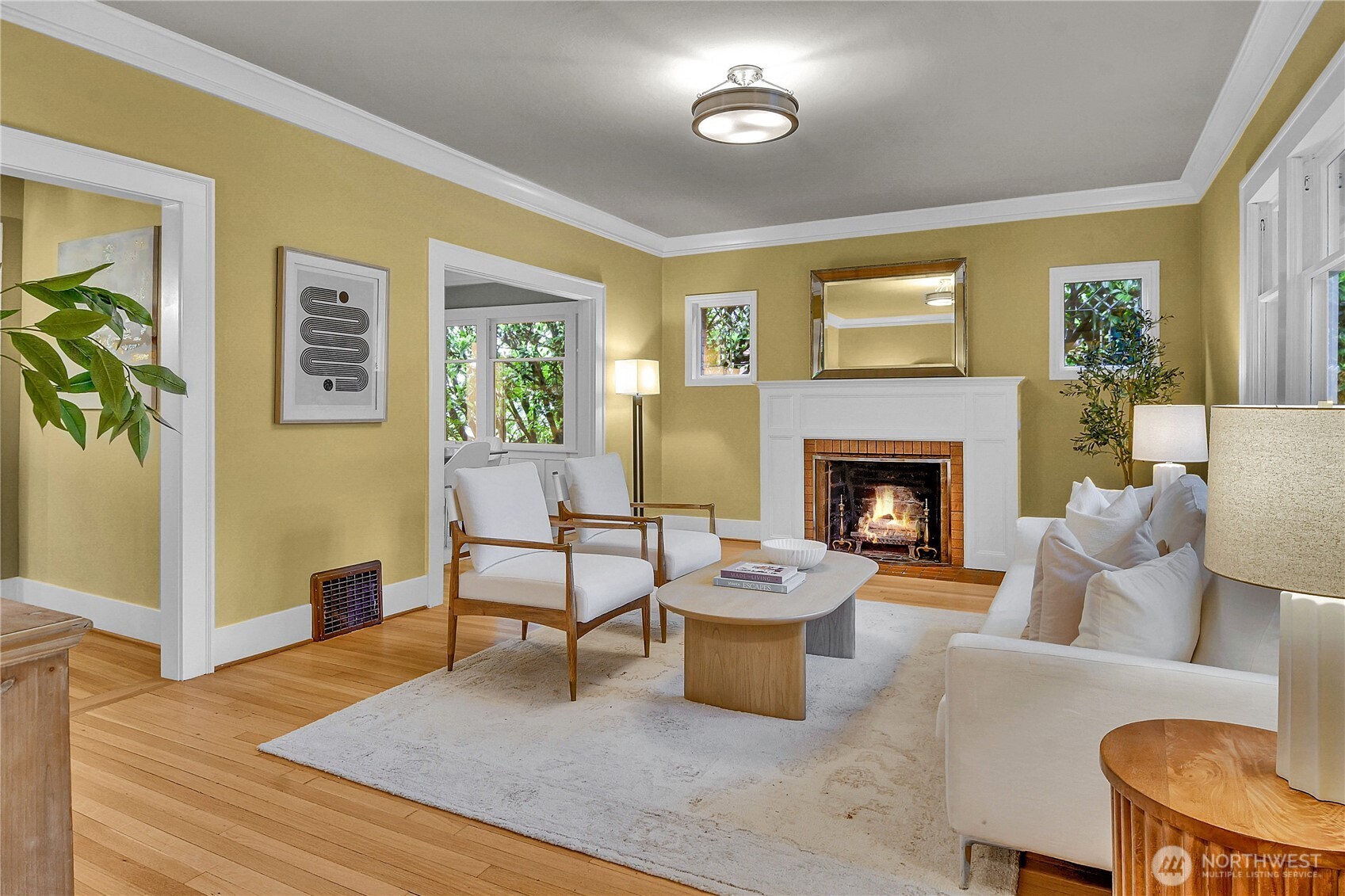 110 Smith Street Seattle, WA 98109 - Photo 2 of 35 a living room with furniture and a fireplace