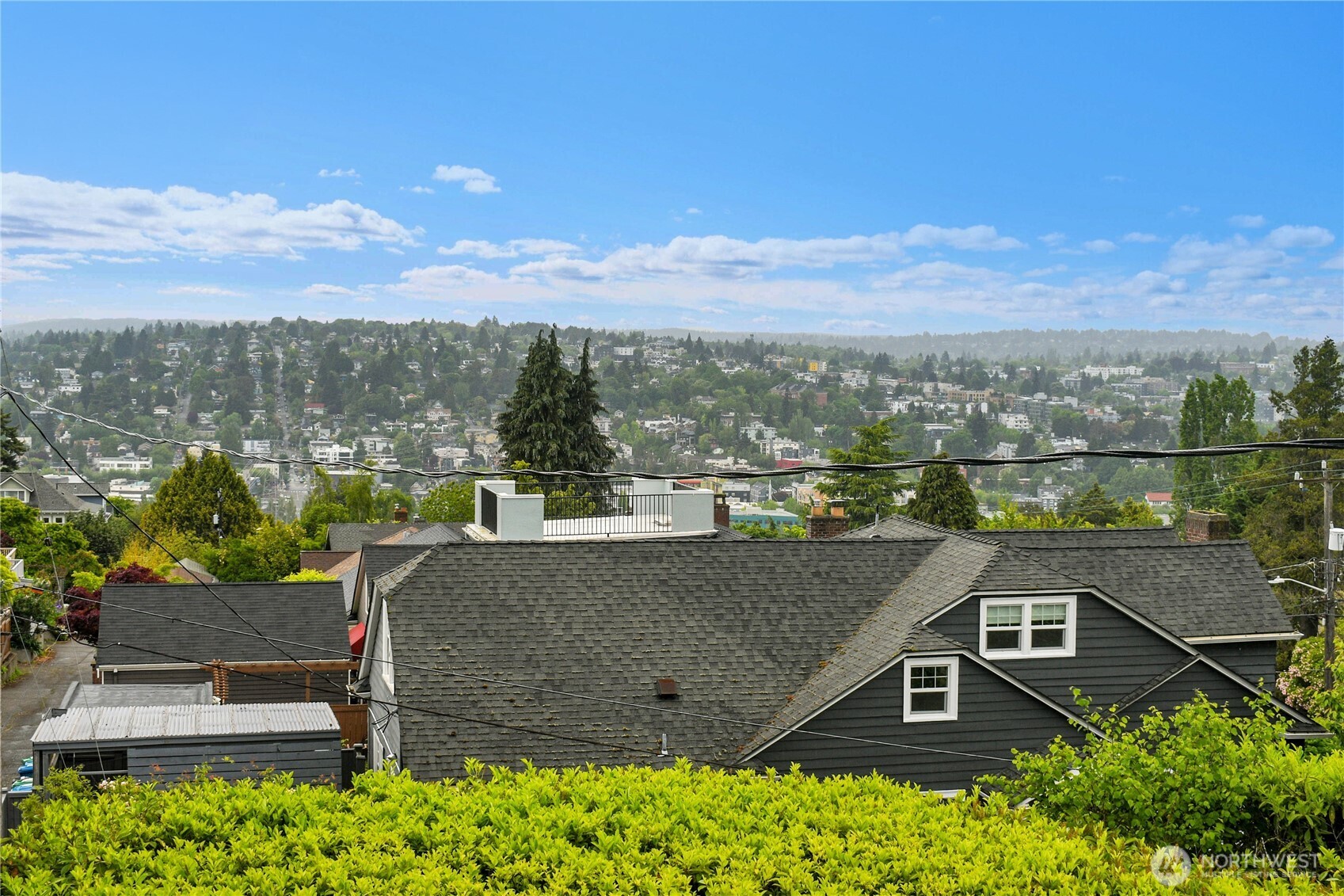 110 Smith Street Seattle, WA 98109 - Photo 29 of 35 a view of a terrace with a garden