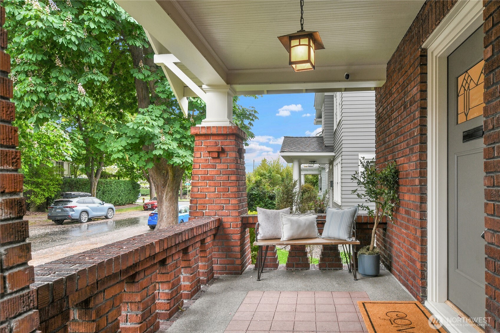 110 Smith Street Seattle, WA 98109 - Photo 35 of 35 a view of a patio with table and chairs and potted plants