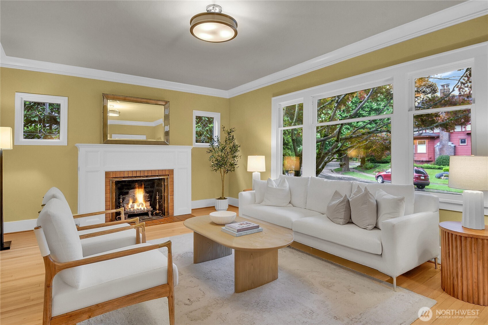 110 Smith Street Seattle, WA 98109 - Photo 4 of 35 a living room with furniture and a fireplace
