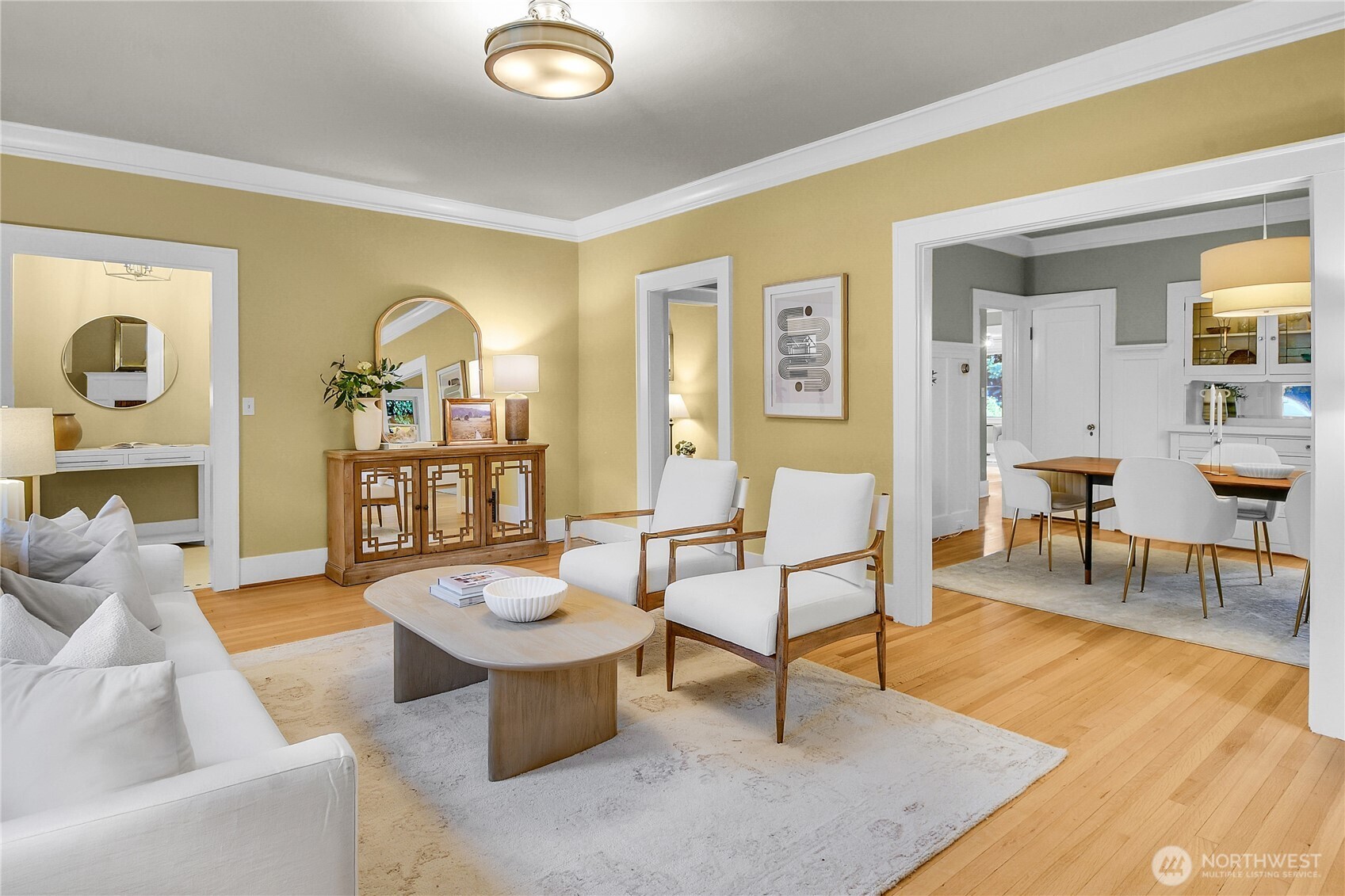 110 Smith Street Seattle, WA 98109 - Photo 5 of 35 a living room with furniture and a wooden floor