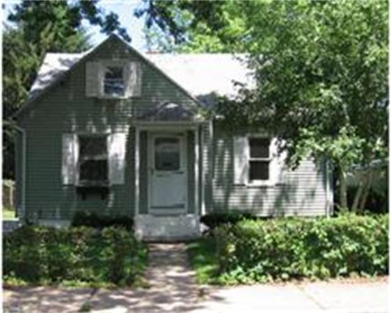 62 Victoria Street Springfield, MA 01104 - Photo 1 of 1 a front view of a house with a yard