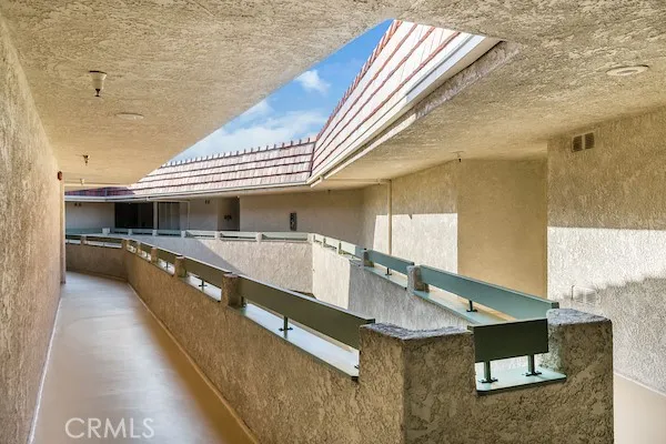 a lobby with furniture and window