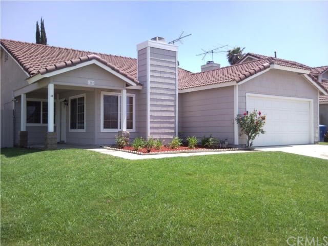 1280 Edelweiss Avenue Riverside, CA 92501 - Photo 1 of 1 front view of a house with a yard
