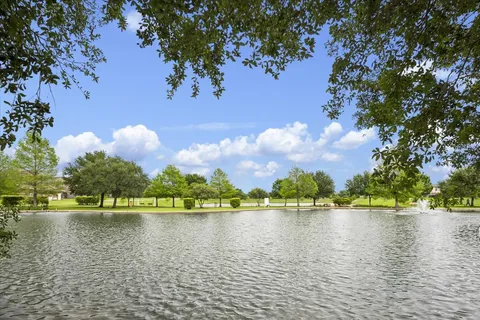 a view of a bench sitting in the park