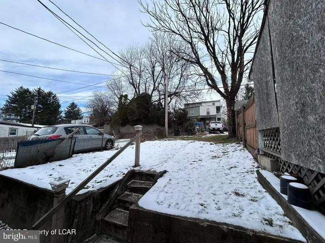 a view of a terrace with furniture