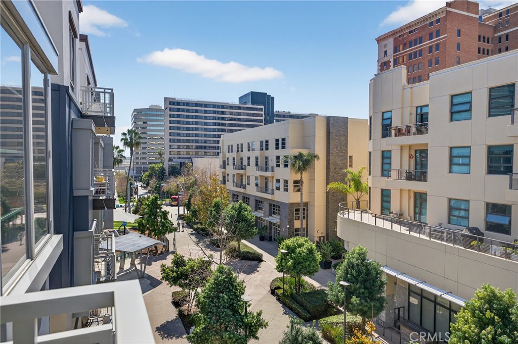 150 The Promenade North, Unit 415 Long Beach, CA 90802 - Photo 40 of 46 a city view with tall buildings and street