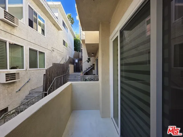 a view of a back yard of the house