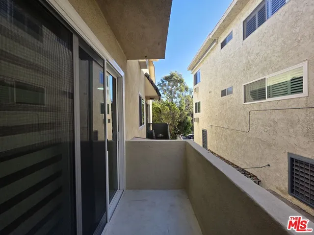an empty room with a bathroom