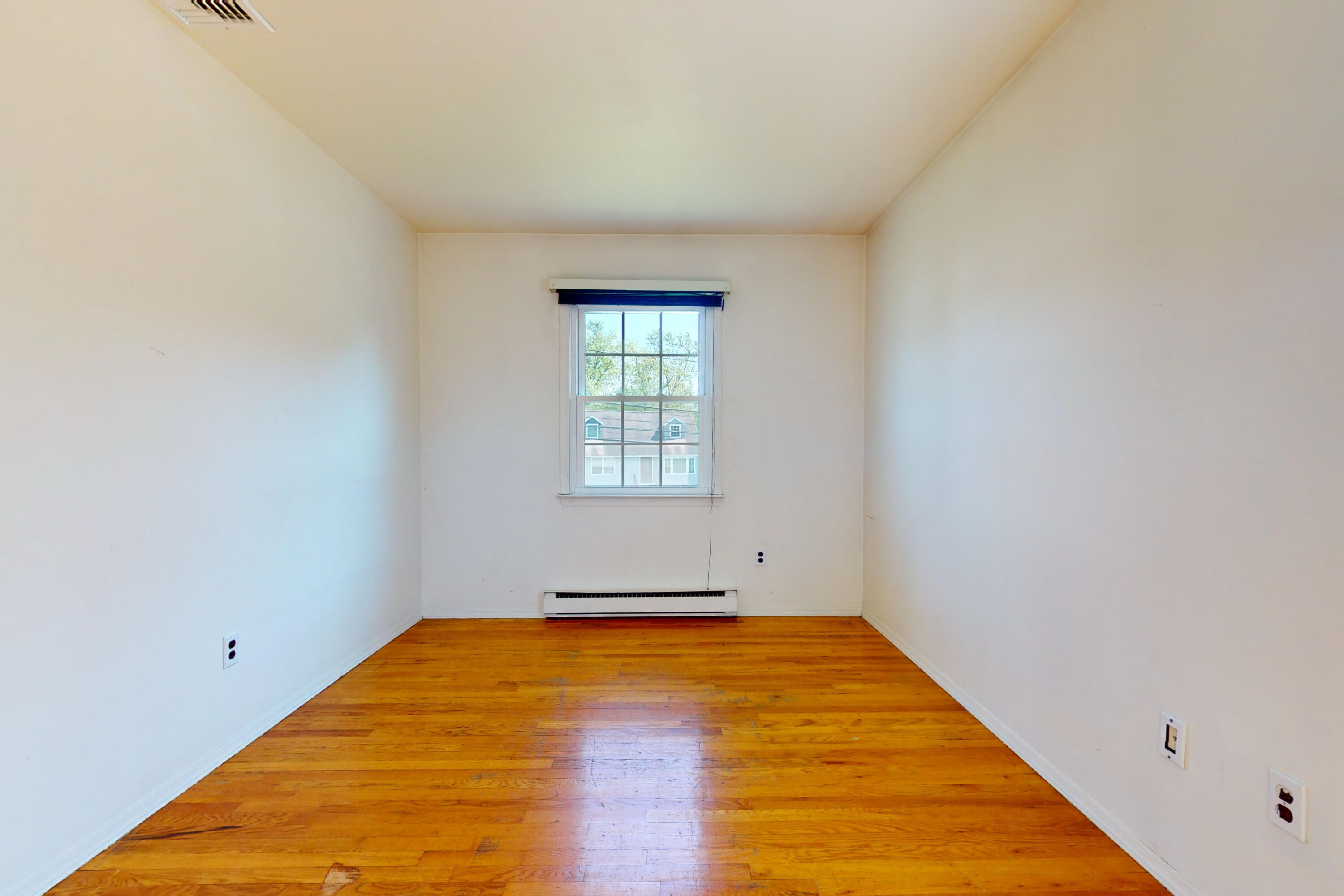 47 Mitchell Street Stamford, CT 06902 - Photo 11 of 22 a view of empty room with wooden floor