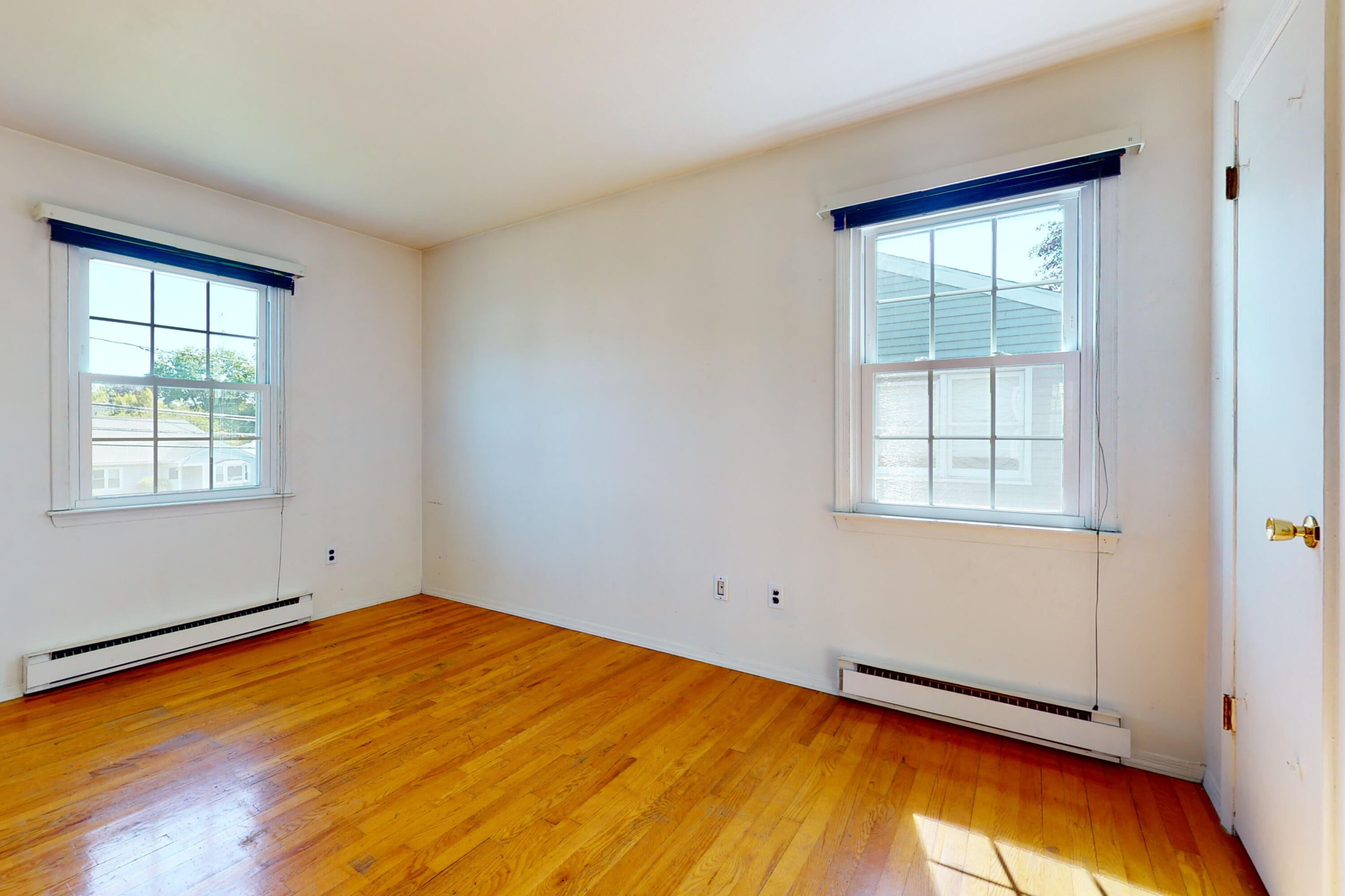 47 Mitchell Street Stamford, CT 06902 - Photo 13 of 22 a view of empty room with window