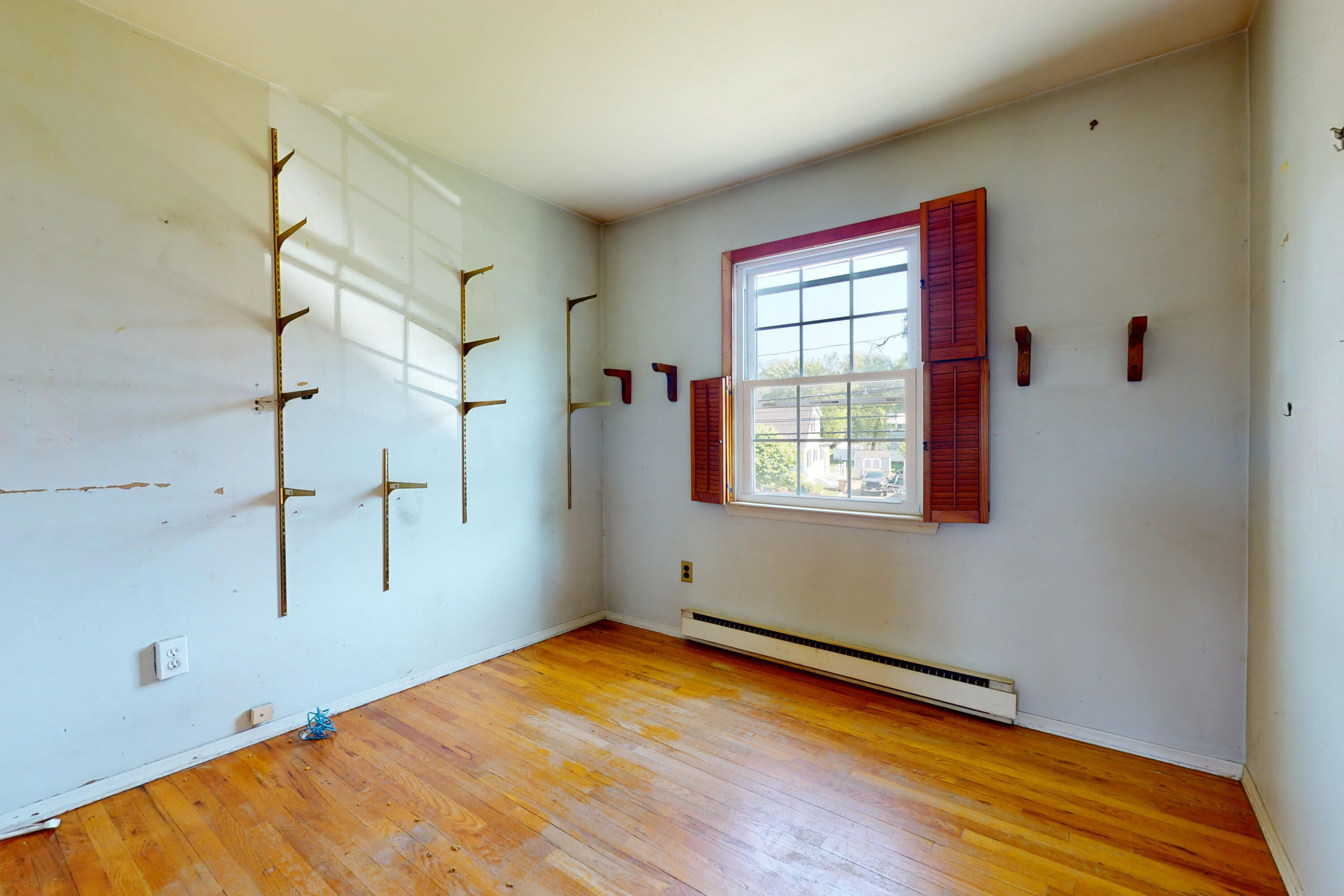 47 Mitchell Street Stamford, CT 06902 - Photo 14 of 22 a view of empty room with wooden floor and fan