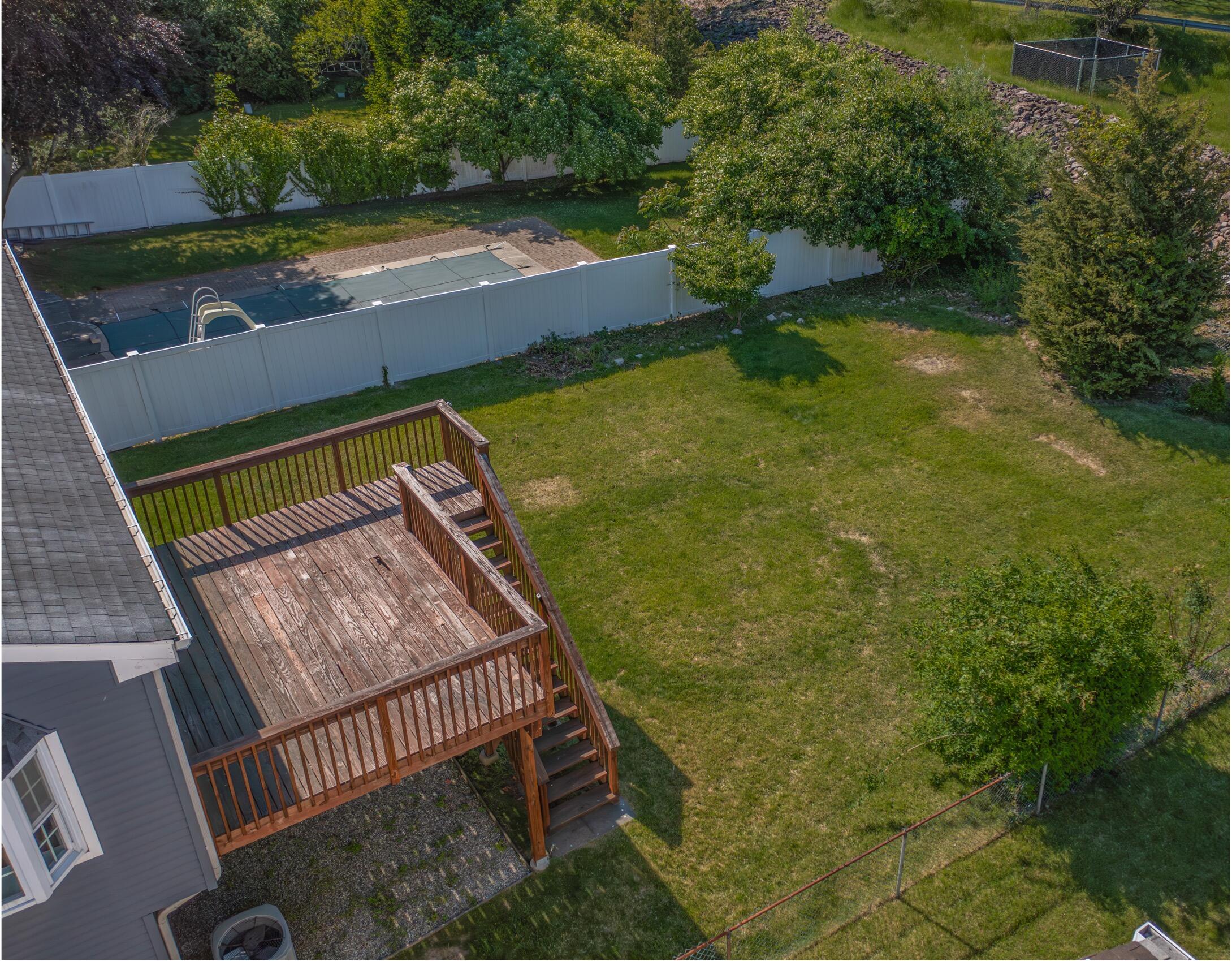 47 Mitchell Street Stamford, CT 06902 - Photo 22 of 22 a view of a backyard with sitting area