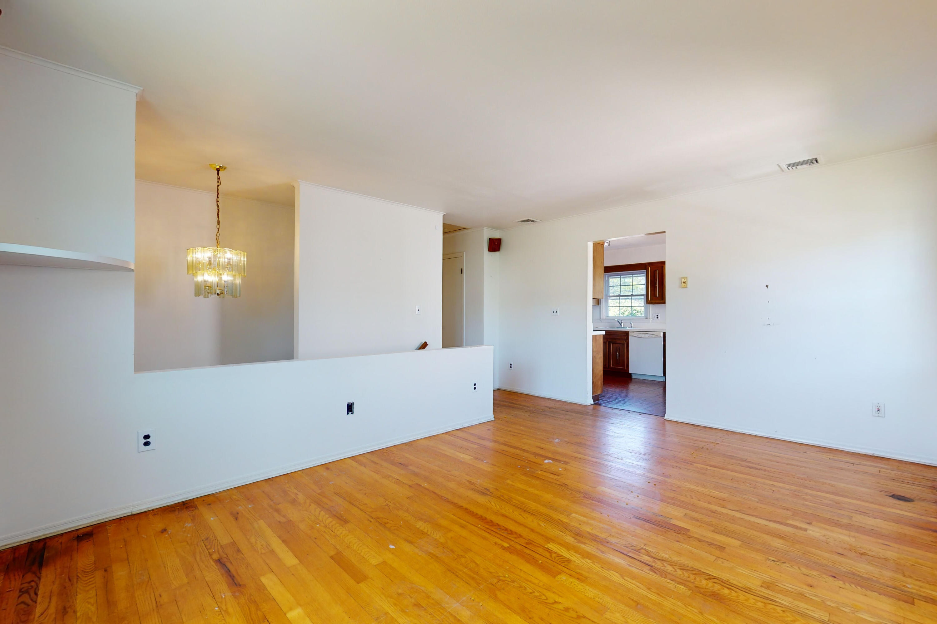 47 Mitchell Street Stamford, CT 06902 - Photo 4 of 22 a view of a room with wooden floor and cabinet