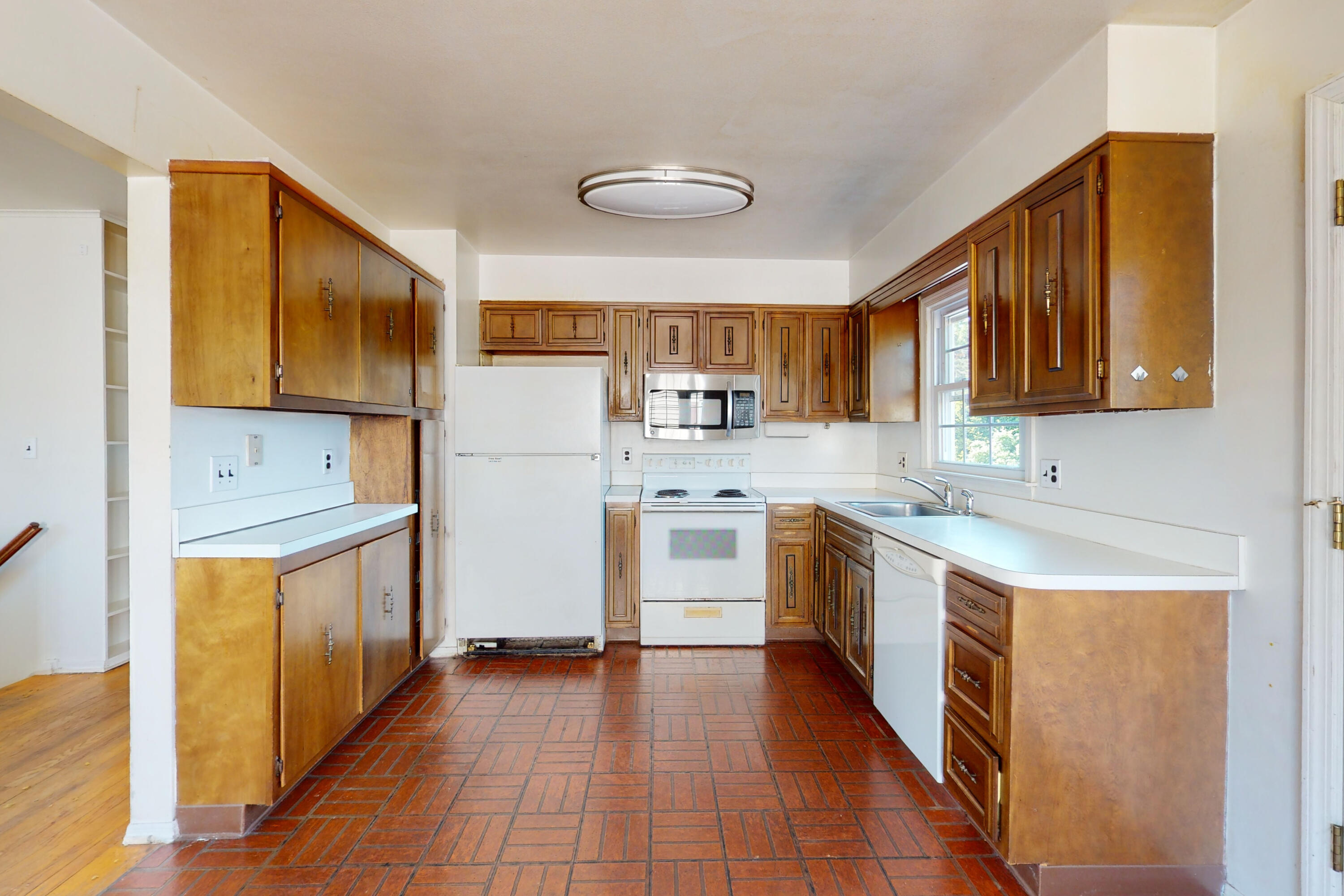 47 Mitchell Street Stamford, CT 06902 - Photo 5 of 22 a kitchen with stainless steel appliances granite countertop a stove a sink dishwasher and a refrigerator