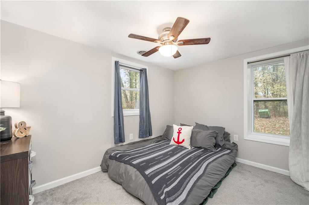 100 Blom Road Grove City, PA 16127 - Photo 20 of 31 a bedroom with a bed and a window