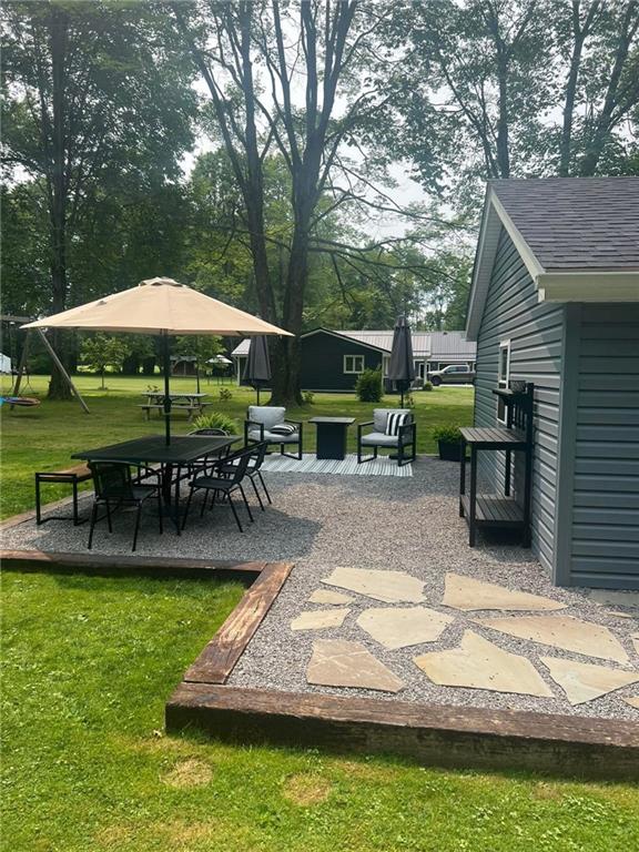 100 Blom Road Grove City, PA 16127 - Photo 28 of 31 a view of a house with backyard porch and sitting area