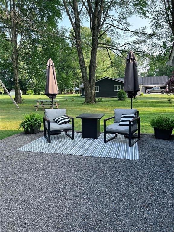 100 Blom Road Grove City, PA 16127 - Photo 29 of 31 a view of a garden with patio