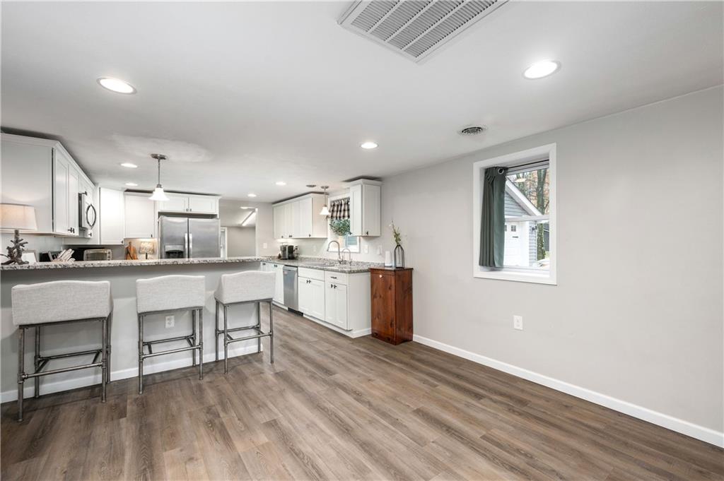 100 Blom Road Grove City, PA 16127 - Photo 8 of 31 a kitchen with white cabinets and sink