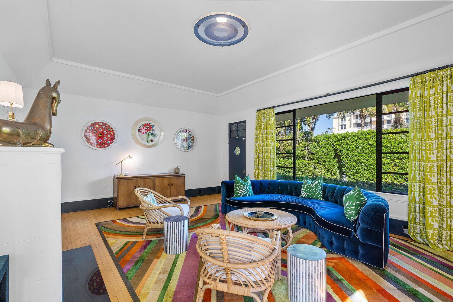 162 Peruvian Avenue Palm Beach, FL 33480 - Photo 12 of 41 a living room with furniture and a floor to ceiling window