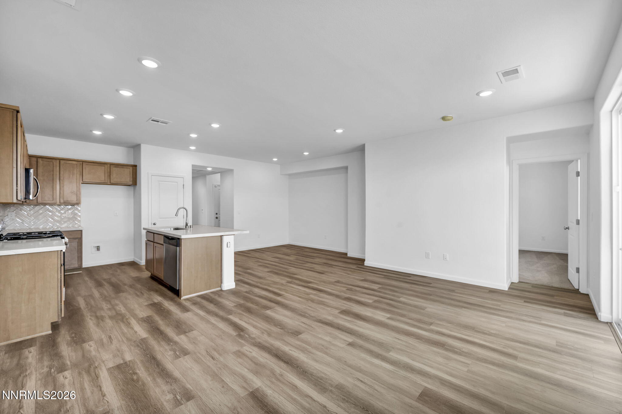 6676 Morgan Mill Road, Unit HOMESITE 14 Carson City, NV 89701 - Photo 5 of 24 a view of kitchen with wooden floor