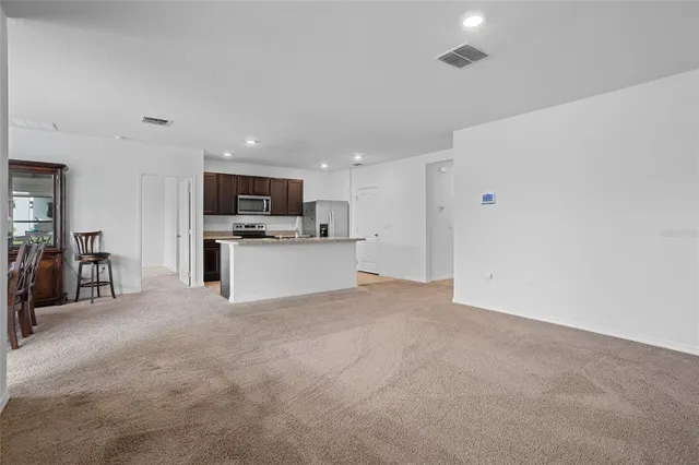 a view of a kitchen with a sink