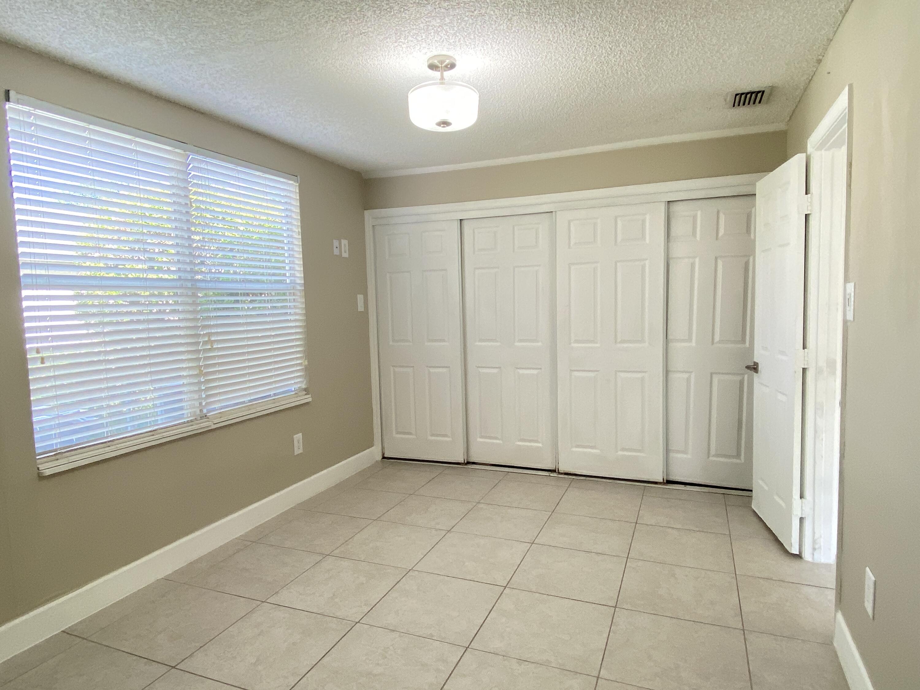 8233 Scenic Turn Boca Raton, FL 33433 - Photo 16 of 39 3rd Bedroom