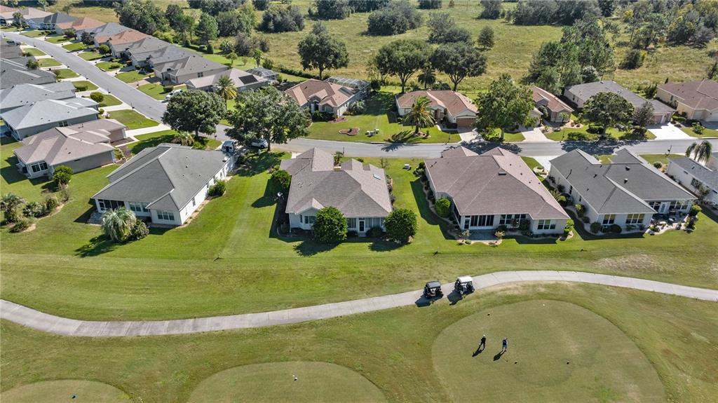 12900 Southeast 97th Terrace Road Summerfield, FL 34491 - Photo 5 of 28 an aerial view of a house