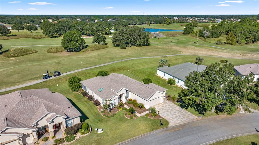 12900 Southeast 97th Terrace Road Summerfield, FL 34491 - Photo 6 of 28 an aerial view of a house with a yard