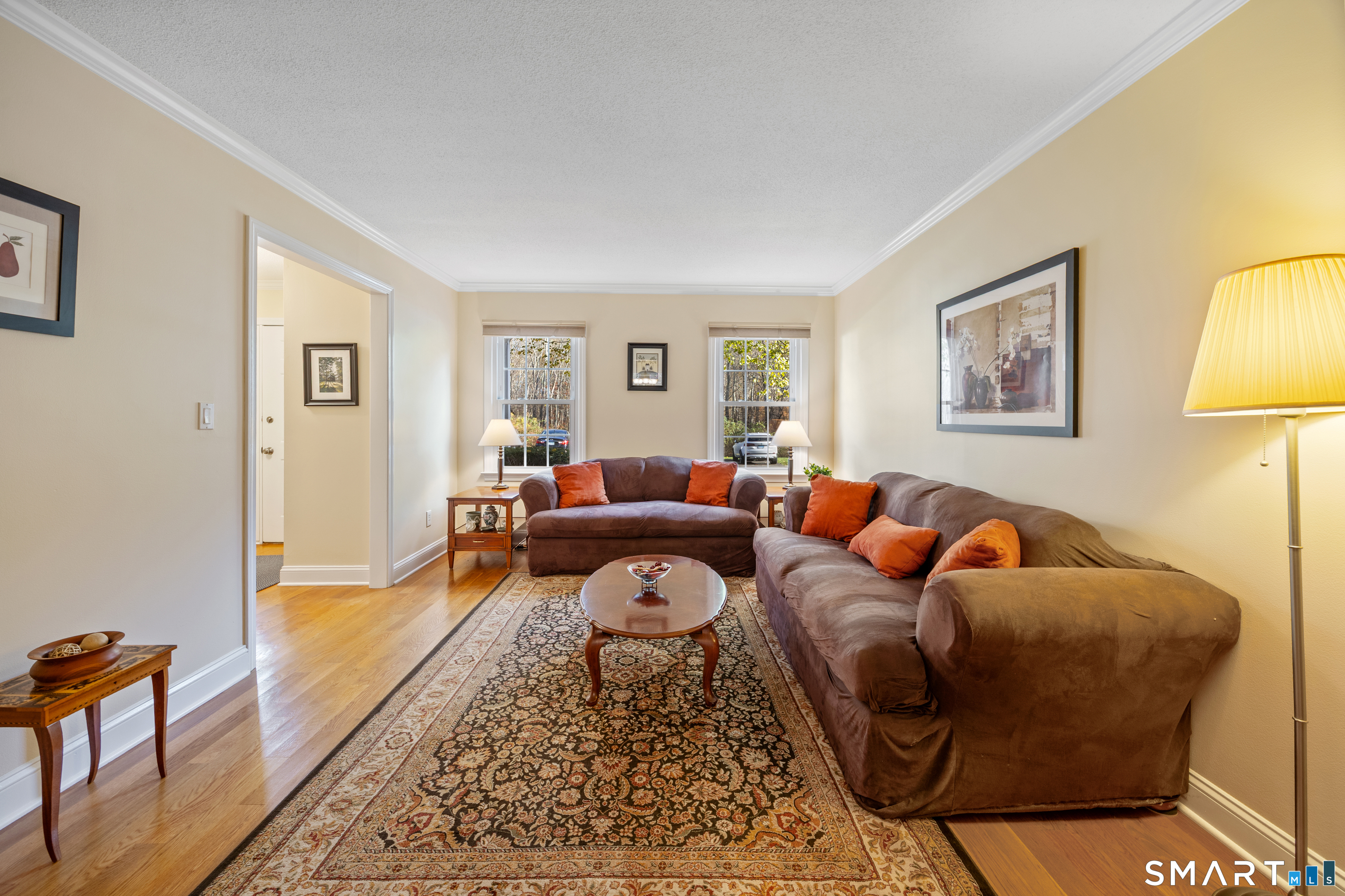 49 Quarry Village Road, Unit 49 Cheshire, CT 06410 - Photo 17 of 37 a living room with furniture and a rug