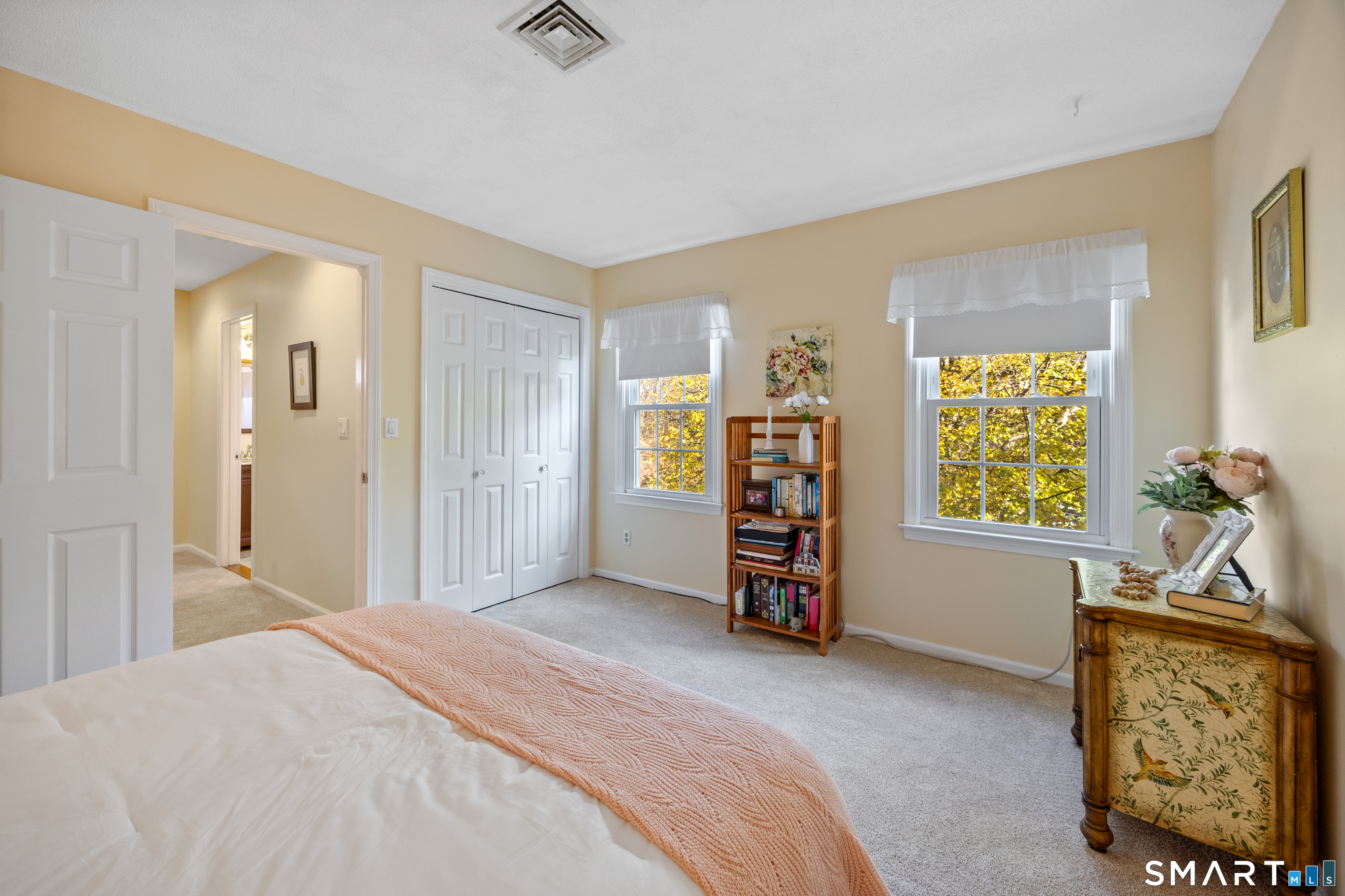 49 Quarry Village Road, Unit 49 Cheshire, CT 06410 - Photo 26 of 37 a bedroom with a bed and a window