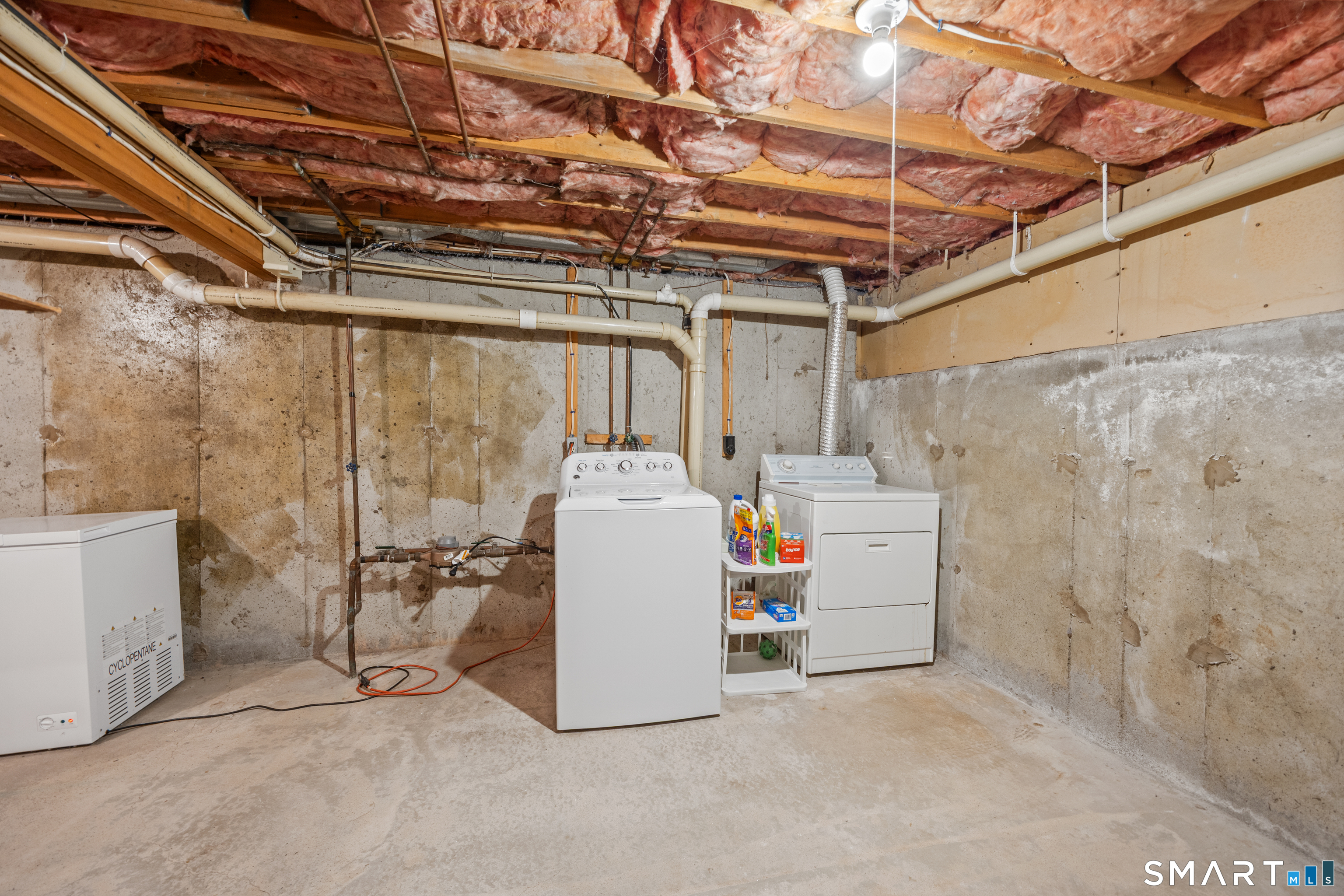 49 Quarry Village Road, Unit 49 Cheshire, CT 06410 - Photo 34 of 37 a utility room with a wooden floor