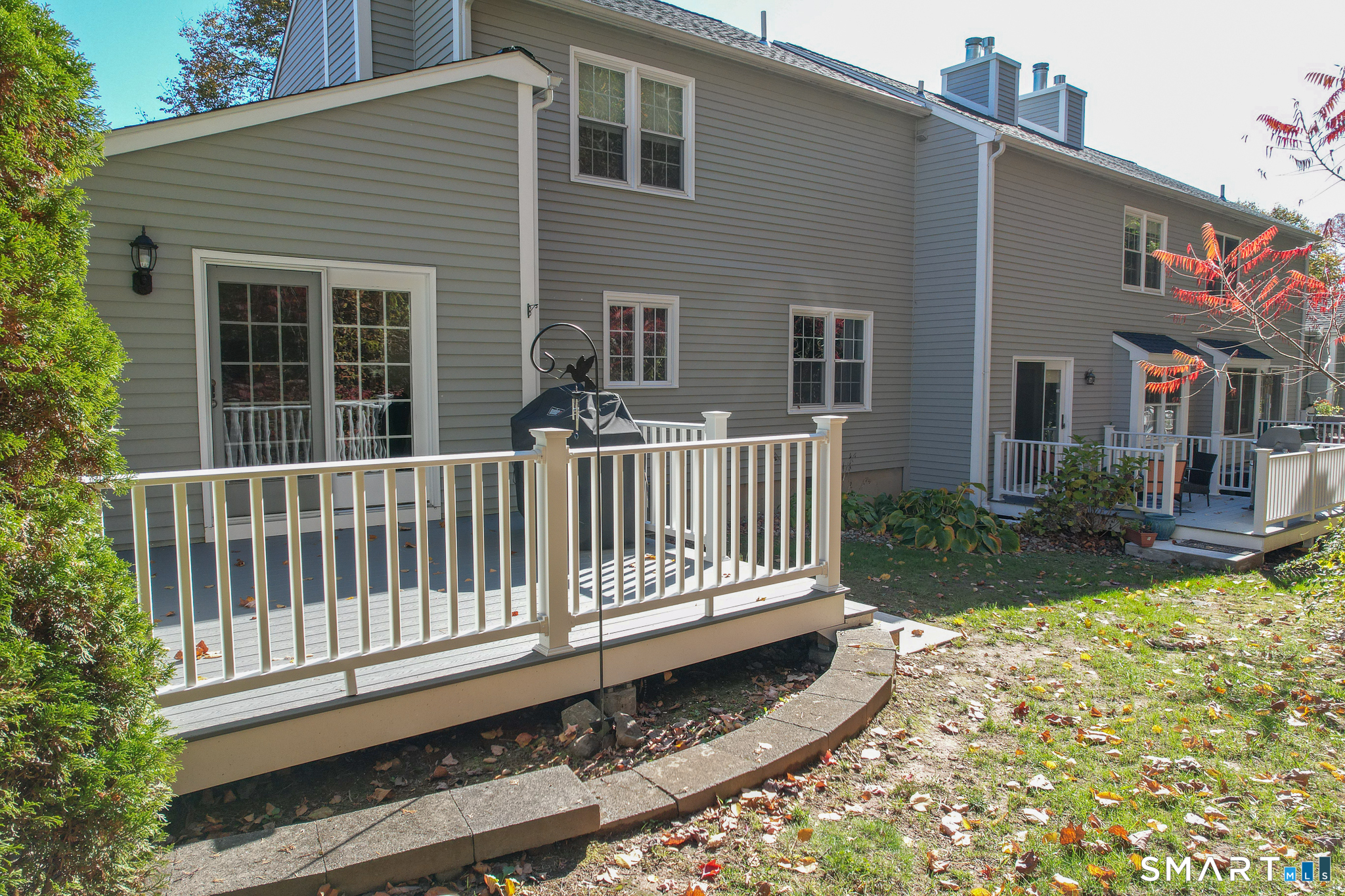 49 Quarry Village Road, Unit 49 Cheshire, CT 06410 - Photo 5 of 37 a view of a house with wooden fence