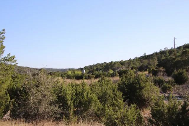 a view of a lake with mountains in the background