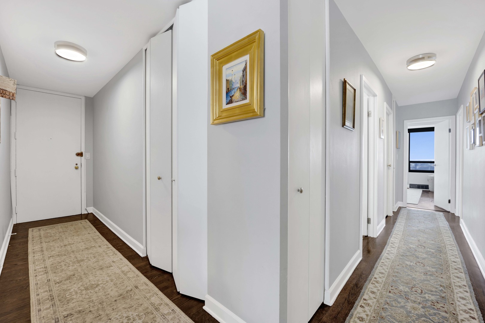 3150 North Sheridan Road, Unit 14A Chicago, IL 60657 - Photo 21 of 31 a view of a hallway with wooden floor and closet