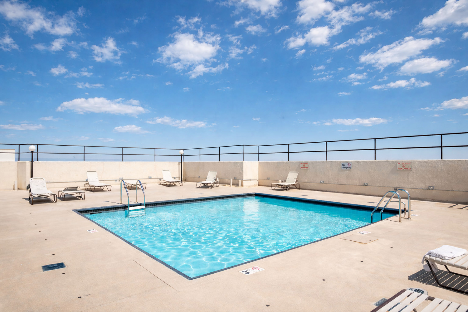 3150 North Sheridan Road, Unit 14A Chicago, IL 60657 - Photo 26 of 31 a view of a swimming pool and a yard