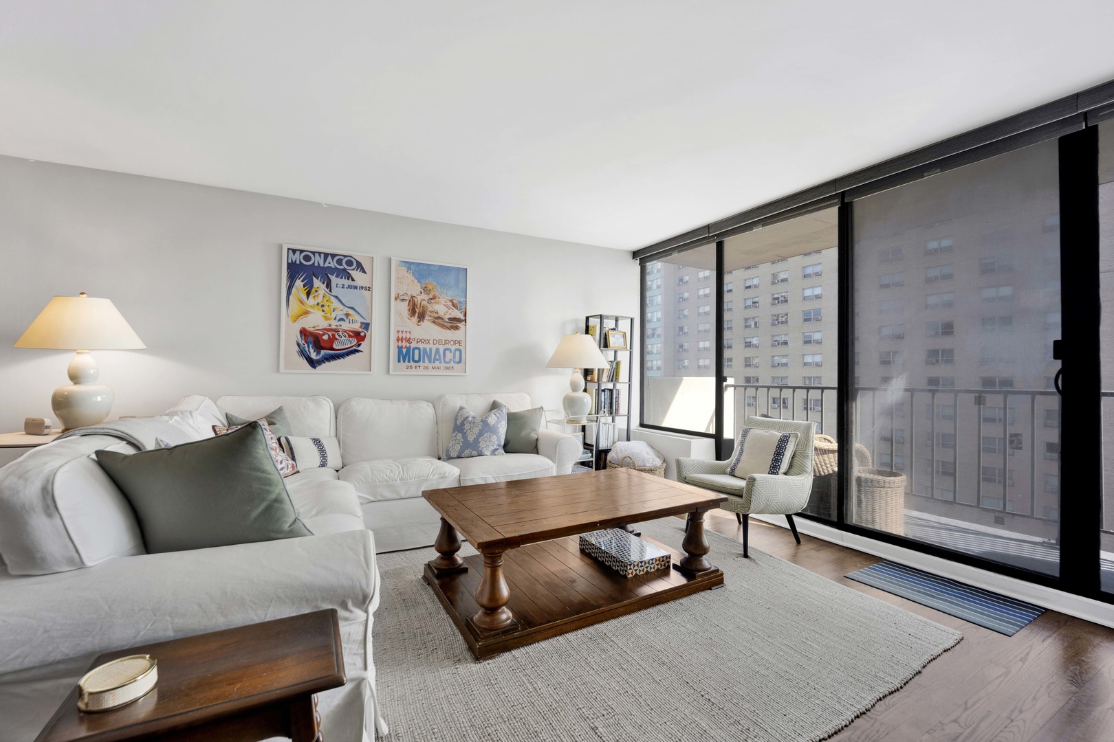 3150 North Sheridan Road, Unit 14A Chicago, IL 60657 - Photo 9 of 31 a living room with furniture and a floor to ceiling window