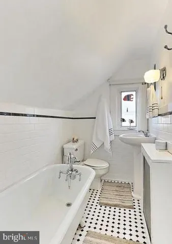 a bathroom with a sink and a bathtub