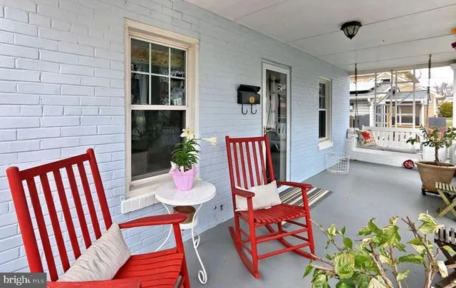 a outdoor living space with furniture and a garden