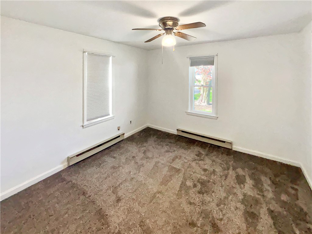 8411 Pitsburg-Laura Road Arcanum, OH 45304 - Photo 7 of 16 This bright bedroom offers comfort and a tranquil ambiance for peaceful repose.