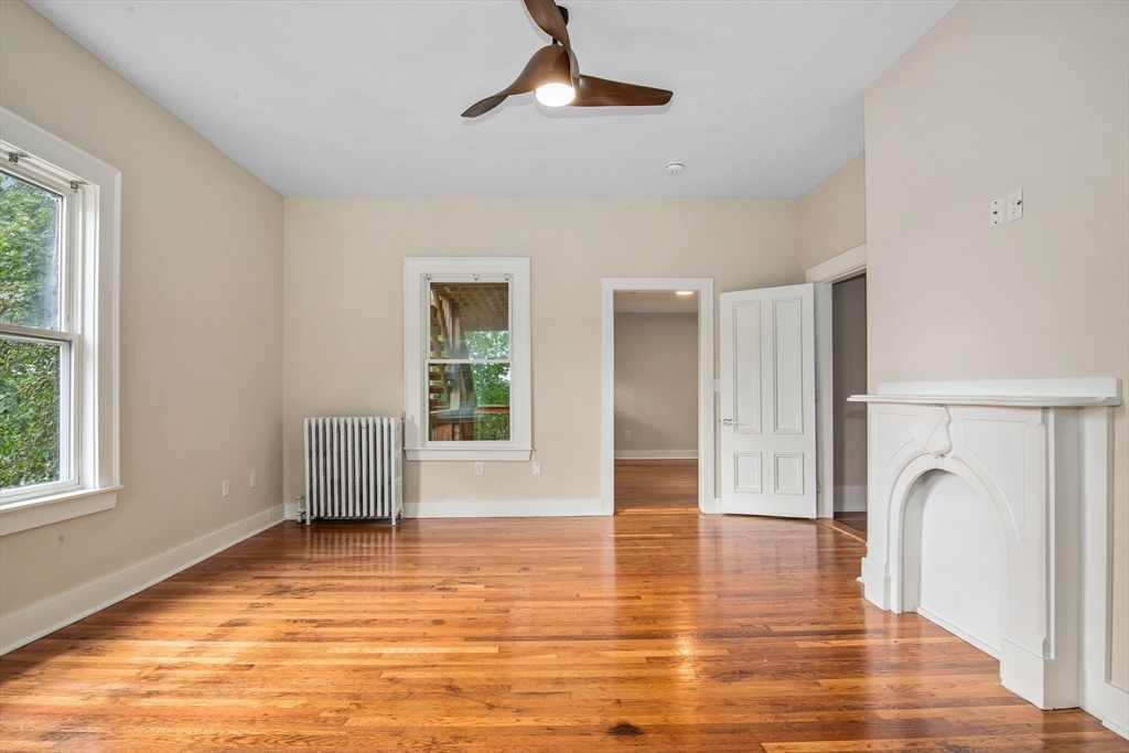 35 Oak Avenue Worcester, MA 01605 - Photo 13 of 34 a view of empty room with wooden floor and fan