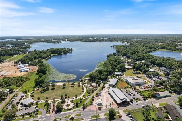 a view of a lake with a yard