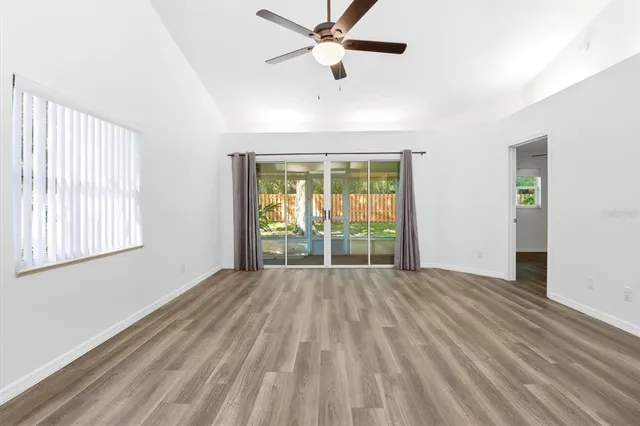 a view of an empty room with a window